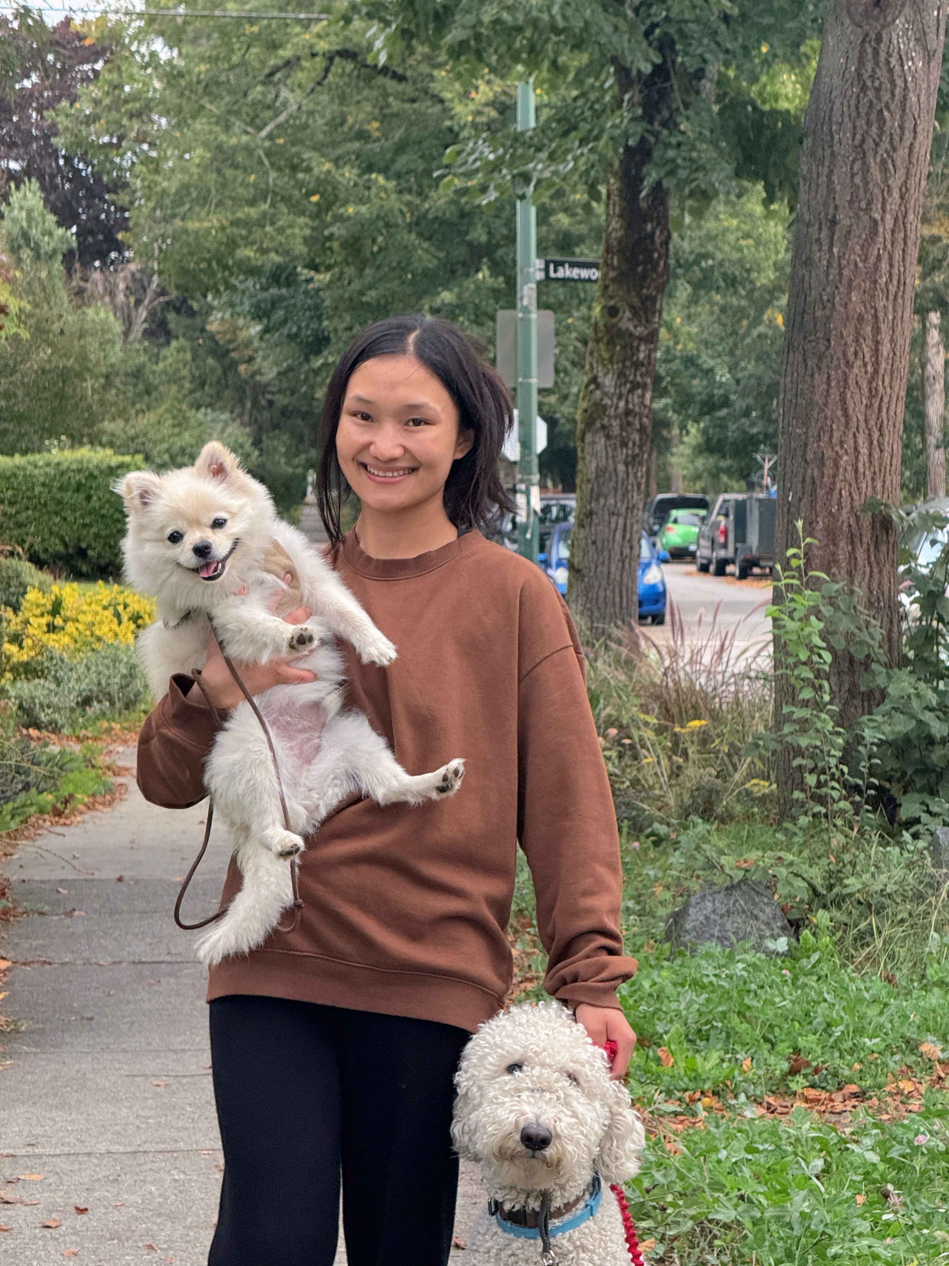 Kinley holding a dog